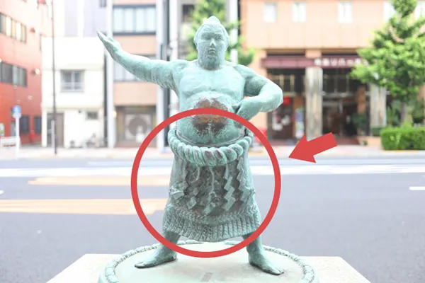 Stone statue of a Yokozuna sumo wrestler